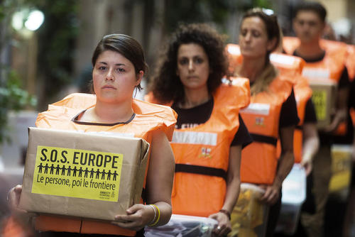 گردهمایی فعالان عفو بین الملل در شهر رم در حمایت از حقوق پناهجویان 